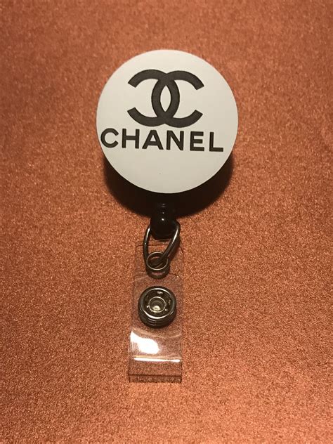 chanel badge reel